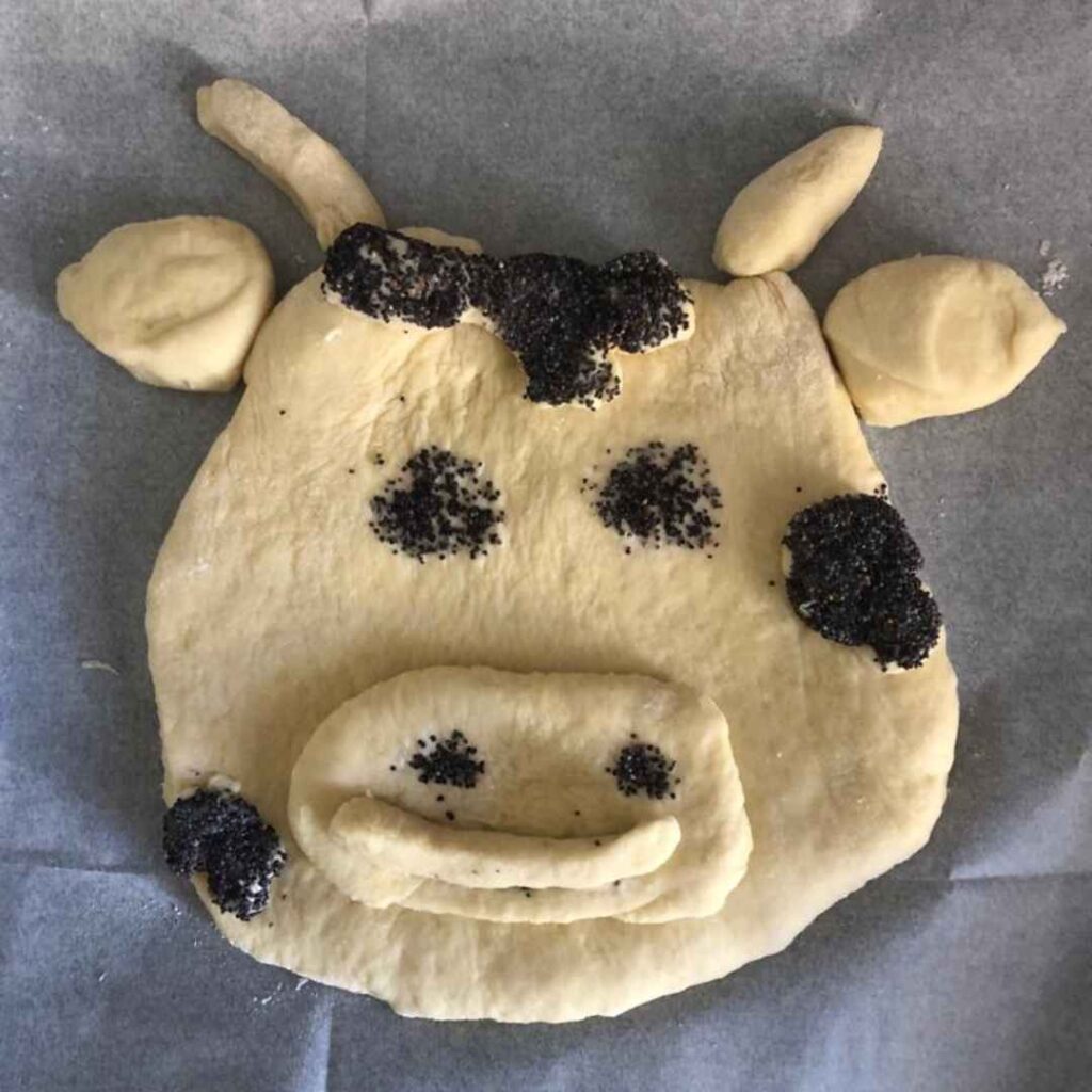 Challah in the shape of a cow's face