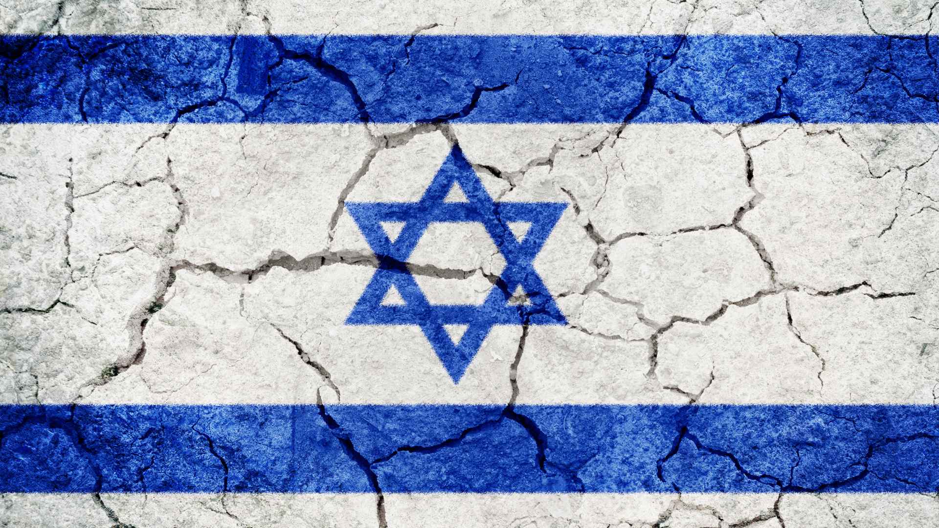 Israeli flag painted over dry and cracked earth