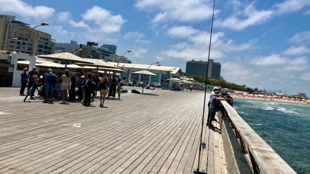 Our group huddled under the minimal shade at the Tel Aviv port